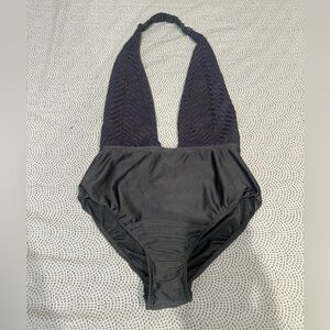 Out from under body suit